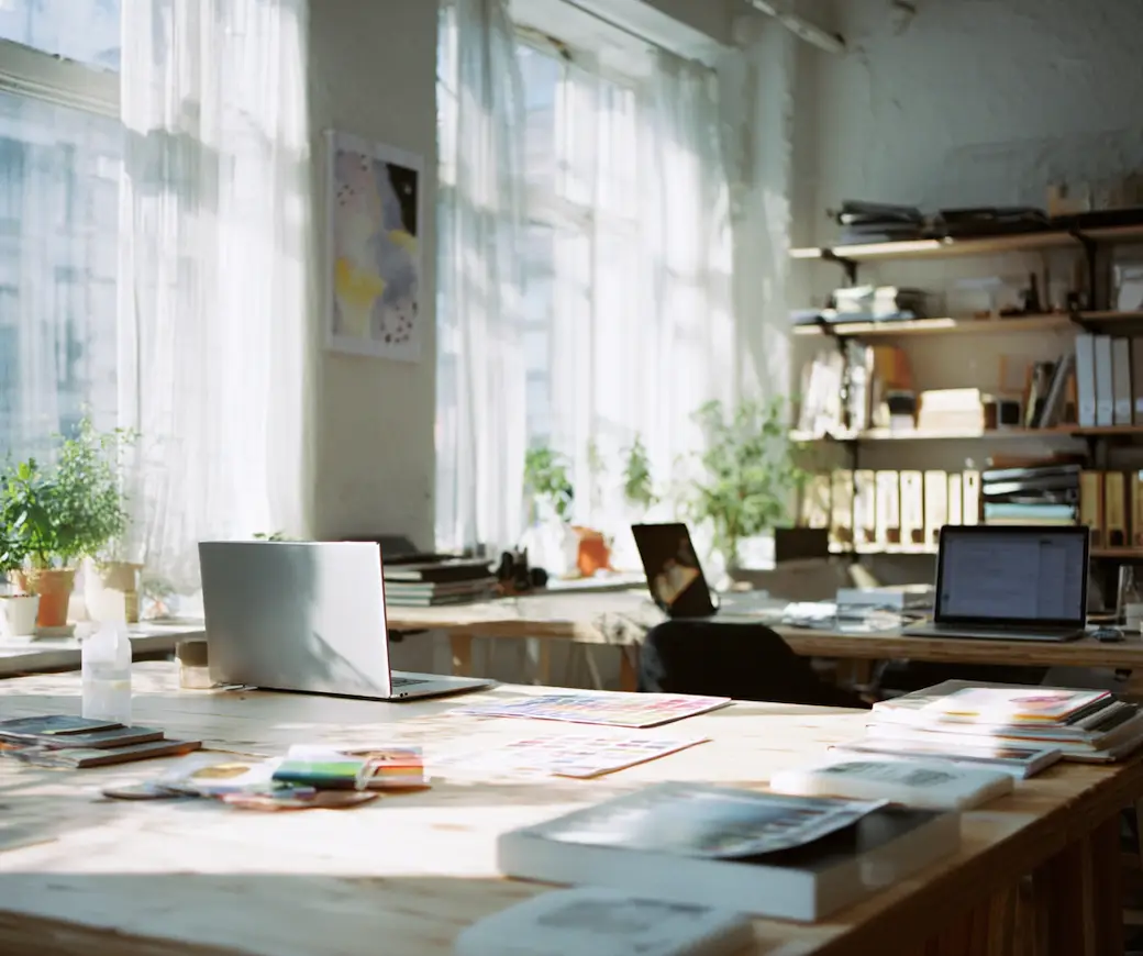 Bright digital agency studio with clean desks, laptops, and plants, ready for new web projects at Chester WorX.
