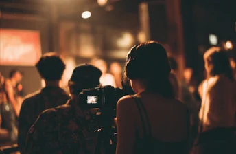 Candid workshop scene representing event recap and story video services